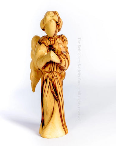Hand Made Olive Wood angel wings Praying from The Bethlehem Nativity Group . www.tbng.co.uk